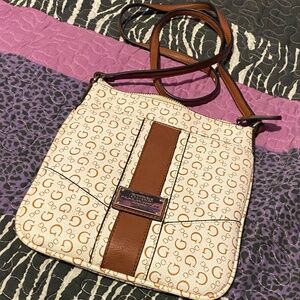Small cream colored Guess purse